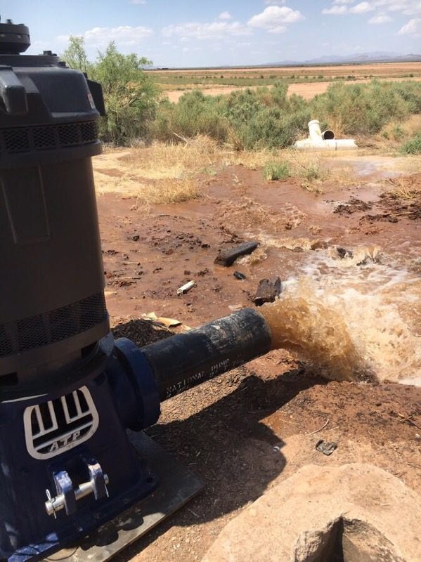Well pump delivering water to a West Texas field near Balmorhea